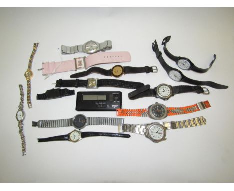 A box containing assorted wristwatches including Swiss Army and Swatch, some spares and repairs 