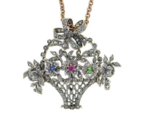 A diamond, ruby, sapphire and emerald basket of flowers pendant, early 20th c, 29mm and a gold necklet, 12.9g The small caboc