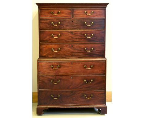 A George III mahogany chest on chest, c1800, flared cavetto cornice above two short, three long and three further long gradua