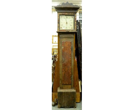 A George III oak thirty hour longcase clock, late 18th c, the painted dial with date aperture in walnut banded case, pendulum