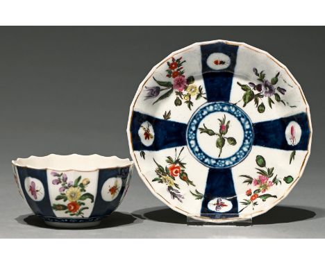 A Worcester fluted&nbsp; tea bowl and saucer, c1770,&nbsp;Queen's pattern and enamelled with loose bouquets and sprigs, sauce