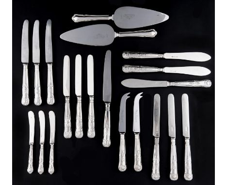 A set of twenty four Victorian silver fish knives, King's pattern, by Harrison Brothers &amp; Howson, Sheffield 1865, hafts b