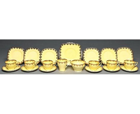 A J H Cope Wellington china yellow ground tea service, second quarter 20th c, printed mark (21) Good condition