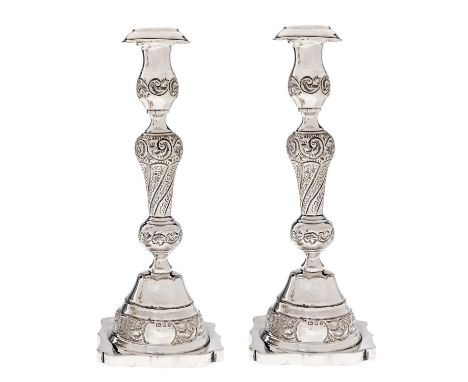 A pair of&nbsp; George V silver candlesticks, nozzles,&nbsp; 27cm h, by Rosenzweig, Taitelbaum &amp; Co, London 1924, 12ozs 1