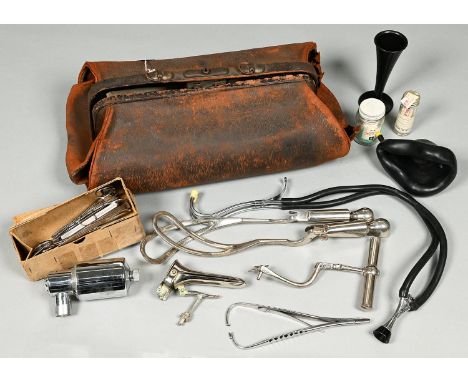 A vintage doctors bag, containing miscellaneous contemporary medical apparatus 