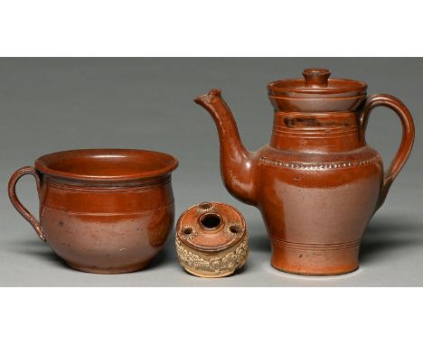 A Derbyshire saltglazed brown stoneware handled pot or porringer, Chesterfield or Brampton, late 18th or early 19th c and a s