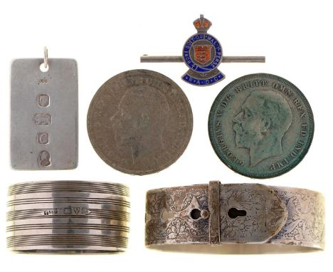 Silver Coins. Crown 1935 (2), a silver bangle, napkin ring, ingot pendant and silver and enamel Royal Army Ordnance Corps swe