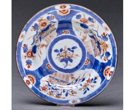 A Chinese Imari plate, 18th c, 22.5cm diam and another (2) The first riveted repair to crack and small chip on rim, the secon