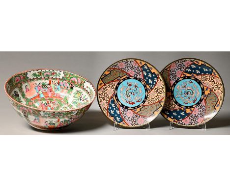 A pair of Japanese cloisonne enamel plates, decorated with a stylised dragon amidst clouds to the turquoise centre within a m
