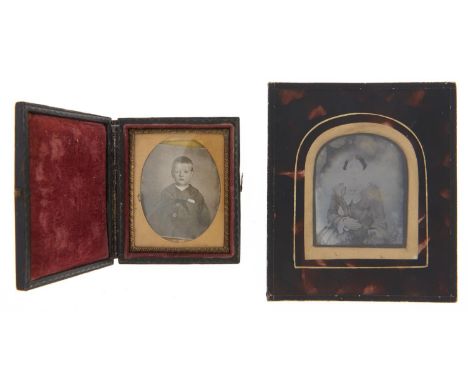 A Victorian embossed leather covered photograph case and a contemporary ambrotype photograph (2) 