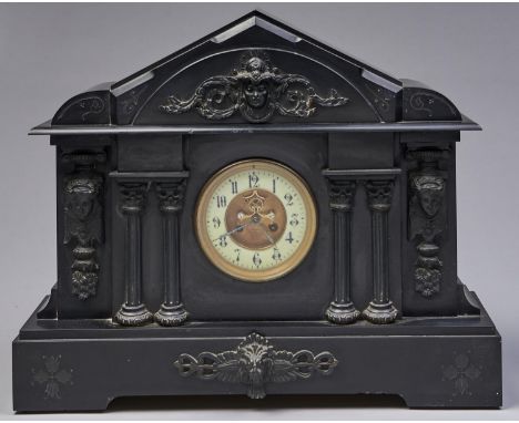 A French architectural belge noir and bronzed metal mounted mantel clock, late 19th c, with brocot escapement and coiled wire