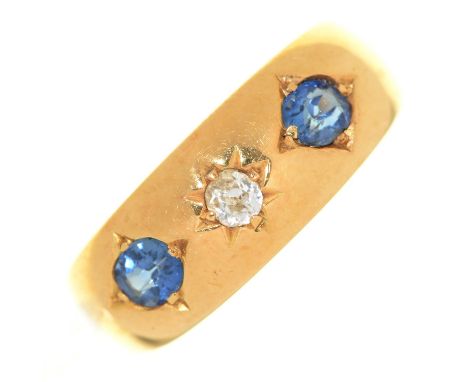 An Edwardian sapphire and diamond ring, in 18ct gold, gypsy set, Birmingham 1904, 3g, size L Light wear only
