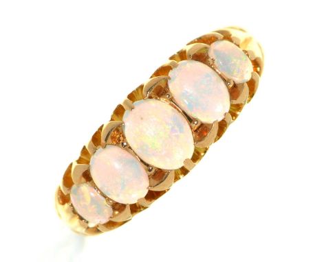 An opal ring, early 20th c, in 18ct gold, marks rubbed, 2.7g, size K Opals lacking polish from wear, not chipped