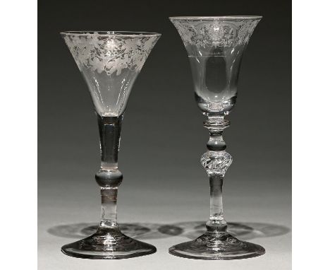 A 'Newcastle' light bluster wine glass, c1750, the bell bowl engraved with flowers and foliage, the stem with central teared 