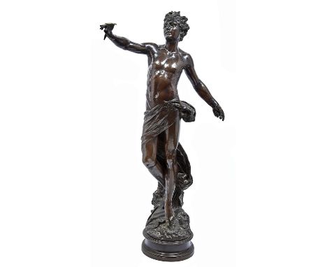 A bronzed copper electrotype half life sized statuette of a semi naked youth, 20th c, holding an oil lamp in his right hand, 