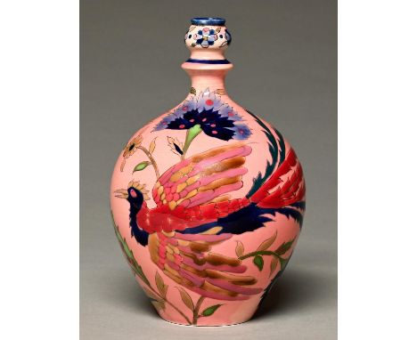 A Zsolnay ewer, c1880,&nbsp;decorated in the Magyar-Turkish style with a long tailed bird, tulips and other flowers on a pink