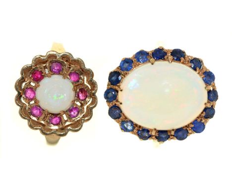 Two opal and sapphire or opal and ruby cluster rings, in gold marked 9ct, 8.7g, size N and O Good condition