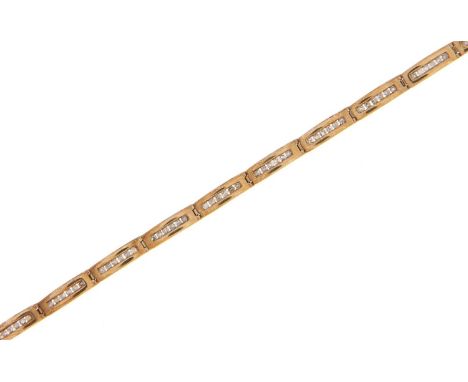 A diamond bracelet, in gold and of channel set rectangular links, marked 7.00 and 375, 11.7g A few light wear scratches only