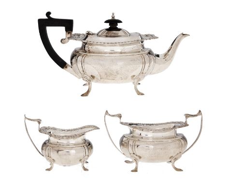 A George V silver tea service, teapot 11.5cm h, by James Deakin &amp; Sons, Sheffield 1916, 19ozs 17dwts (3) Dent on one side