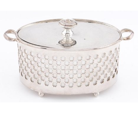 A George V two handled and pierced oval silver dish and cover, with earthenware liner, 12.5cm over handles, by T Wilkinson &a