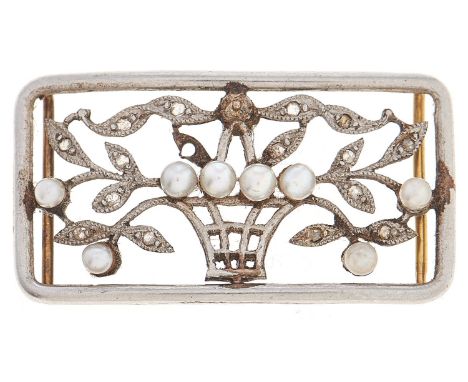 A rectangular framed pearl flower basket slide, early 20th c, with diamond accents, in white gold, 3.2g Lacks one cultured pe
