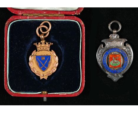 An Edwardian 9ct gold sporting prize watch fob shield, 33mm excluding gold ring attached, Birmingham 1906, 6.3g, cased and a 