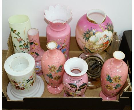 A quantity of Victorian enamelled glass vases, mainly pink, all decorated with flowers, grasses and leafage, together with an