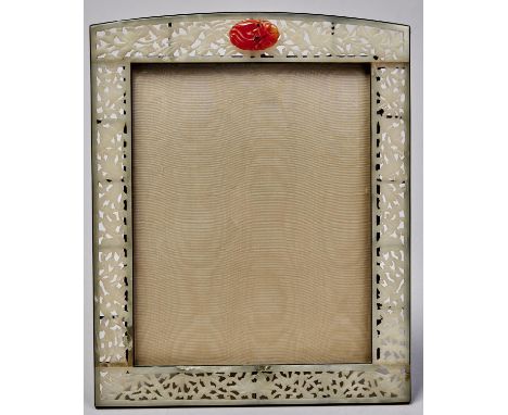 A Chinese jade mounted photograph frame, 1930's, the pierced and carved green stone inset sides with phoenix and flowers, the
