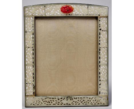 A Chinese jade mounted photograph frame, 1930's, the pierced and carved green stone inset sides with phoenix and flowers, the