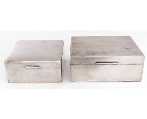 A George VI silver cigarette box, the lid engine turned, cedar lined, 12.5cm l, by Walker &amp; Hall Ltd, Sheffield 1938 and 