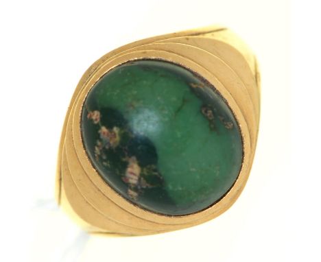 A turquoise ring, in gold marked 14k, 6.7g, size O Stone chipped and lacks polish; light wear