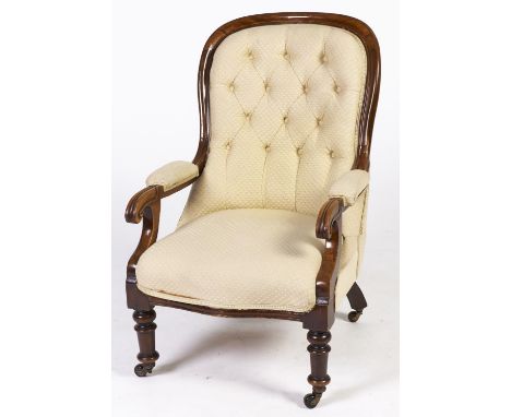 A Victorian mahogany armchair, with padded arms and buttoned upholstery, seat height 36cm Old repair to one arm junction, lig