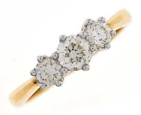 A three stone diamond ring, in 18ct gold, 3.4g, size M Good condition