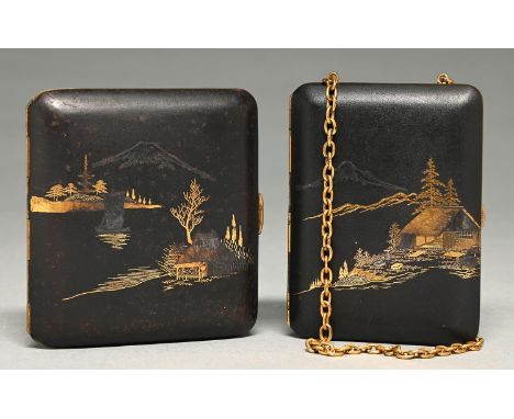 A Japanese Komai-style iron compact, Taisho period, the interior with two lidded compartments and mirror, chain handle, 93mm,