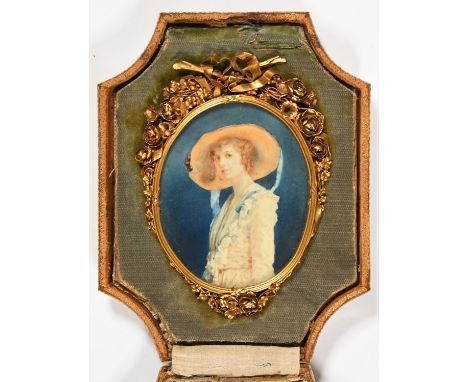 British School, early 20th c - Portrait Miniature of a Young Woman, half length, in a bonnet with blue ribbons, ivory, oval, 