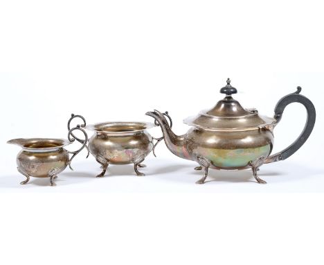 A George V silver tea service, on hoof feet, teapot 13cm h, by James Deakin &amp; Sons, Sheffield 1920 and 1922, 22ozs 8dwts 