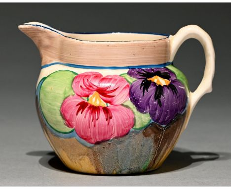 Clarice Cliff. An A J Wilkinson Pansies jug, 1932, 90mm h, printed marks, painted PANSIES Good condition save for very light 