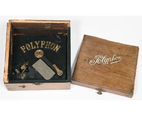 A Musterschutz polyphon,&nbsp;No17474, late 19th c, the walnut veneered case inlaid to the hinge lid 'Polyphon', cast iron pl