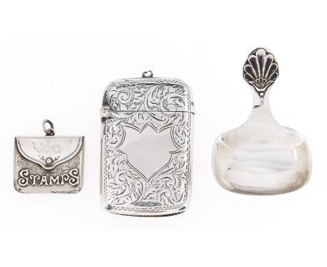 An Edwardian silver envelope shaped postage stamp case, 28mm, by Crisford and Norris, Birmingham 1908, a silver vesta case, B