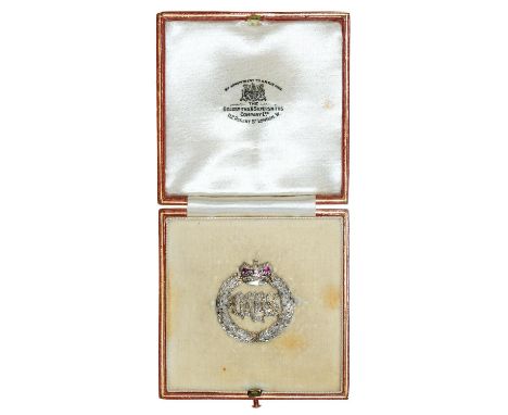 2nd Gadroon Guards (Queen's Bays) A ruby&nbsp; and diamond sweetheart's brooch, early 20th c,&nbsp; in platinum and gold, 32m