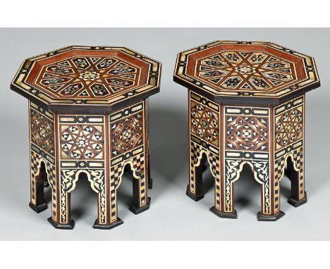 A pair of Turkish octagonal mother of pearl, bone and ebony inlaid&nbsp; tables, early 20th c,&nbsp;31.5cm h; 32 x 32cm Light