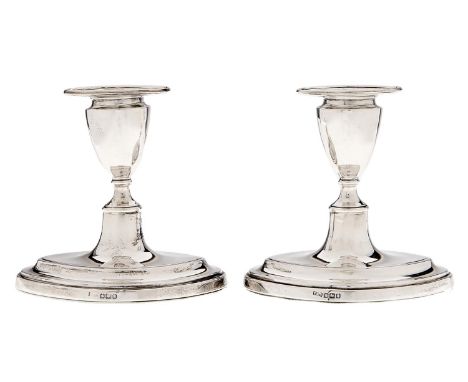 A pair of Edwardian silver dwarf navette shaped candlesticks, nozzles, 11cm h, by Thomas A Scott, Sheffield 1905, loaded Ligh