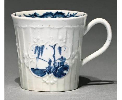 A Worcester blue and white coffee can, c1755-1760,&nbsp; strap fluted and painted with the Fisherman and Willow Pavilion patt