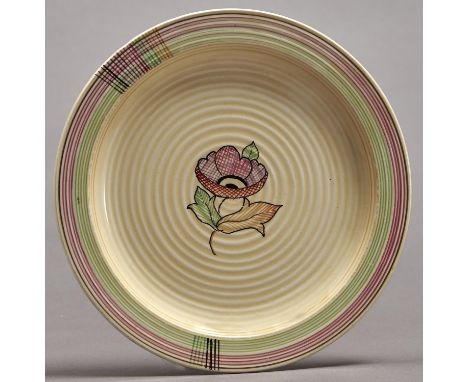 Clarice Cliff. An unusual A J Wilkinson plate, 1934, painted with a version of the tartan pattern, 19cm diam Good condition