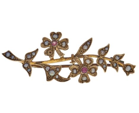 A ruby and split pearl spray brooch, c1900, in gold marked 9ct, 4.1g Several pearls deficient