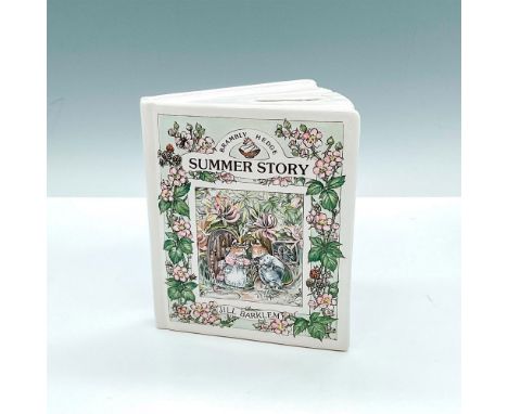 Porcelain coin bank modeled as book titled Summer Story from Jill Barklem's Brambly Hedge series. The front cover runs wild w