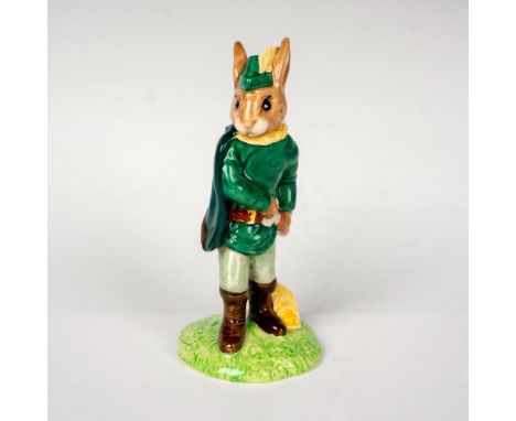 Green tunic, cloak, and cap, brown boots. From the Robin Hood Collection. Royal Doulton backstamp. Artist: M. AlcockIssued: 2