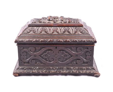 Victorian carved oak tea caddy, sarcophagus form, the interior with three compartments, width 38cm, height 24cm.Condition rep