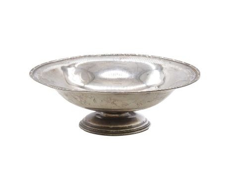 A silver pedestal comport, Barker Brothers Silver Ltd, Birmingham 1927, circular form, pierced border with urn motifs, rim wi