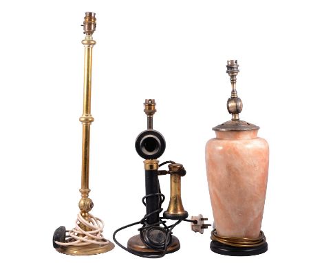 Tall brass lamp base, 59cm overall; an alabaster vase shape lamp base; and a vintage candlestick telephone, serving as a lamp
